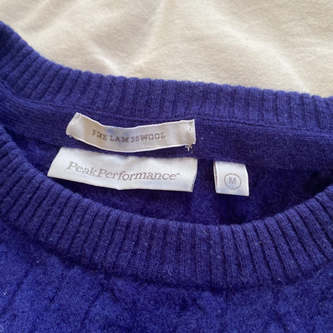 Stickad tröja från peakperformance - 2