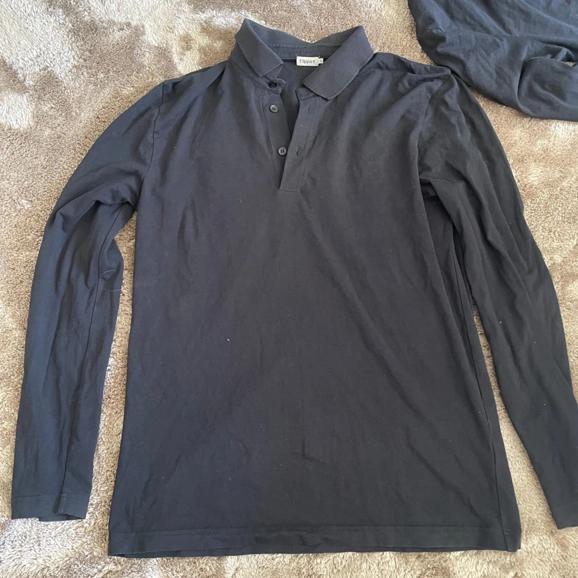 Svart långärmad pikétröja från Filippa K