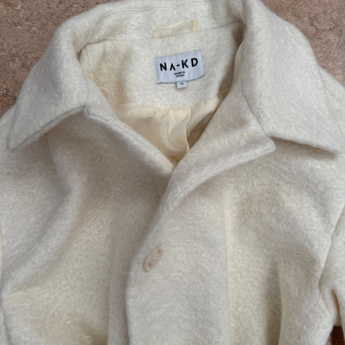 Vit kappa från NA-KD - 1