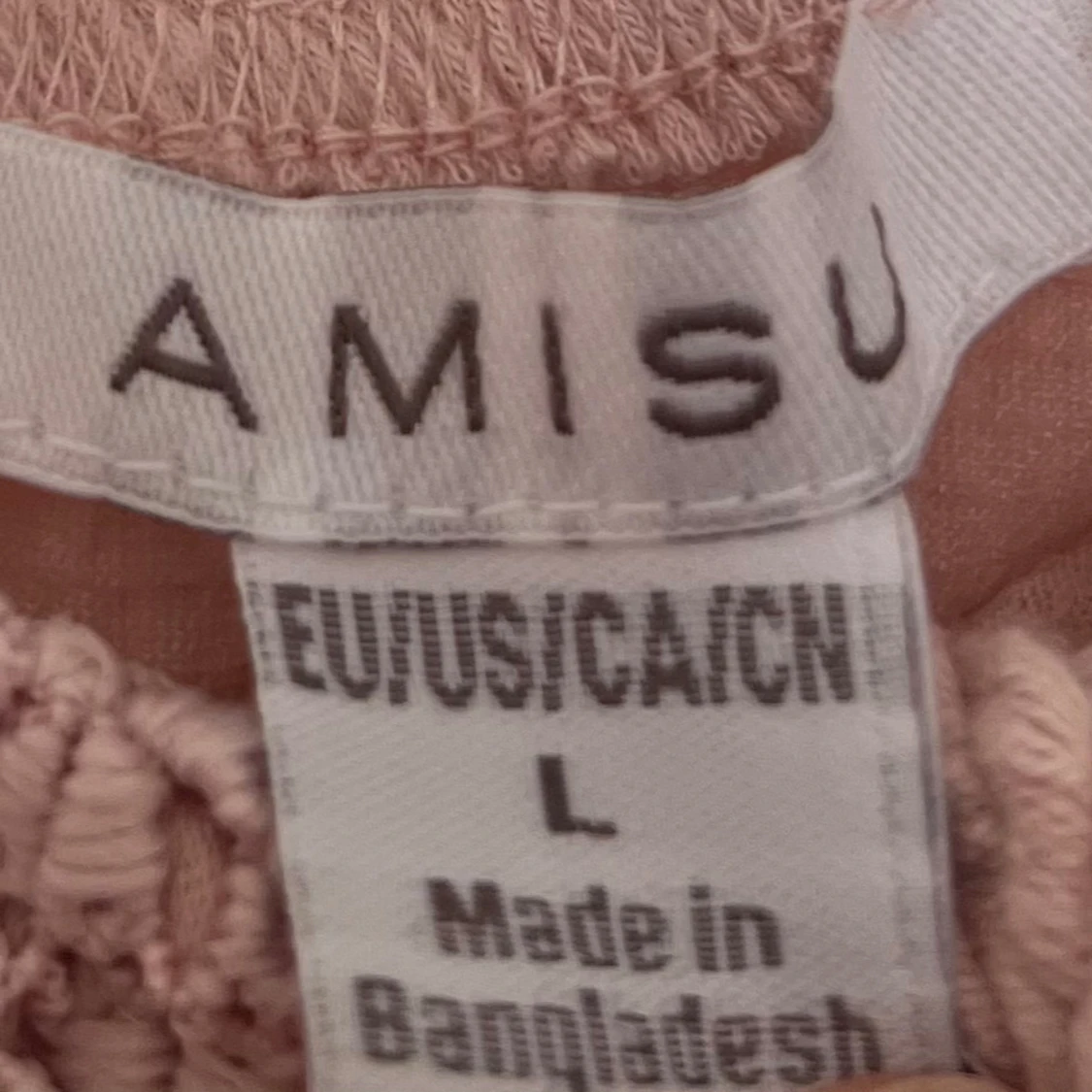 Rosa blus med spets från Amisu - 2