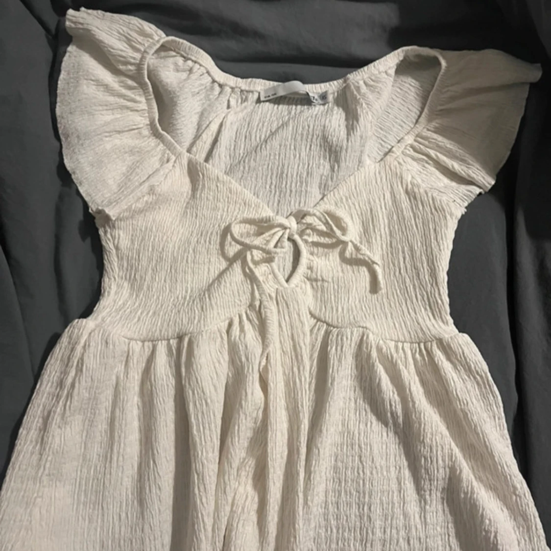 Vit topp med volangärmar 157