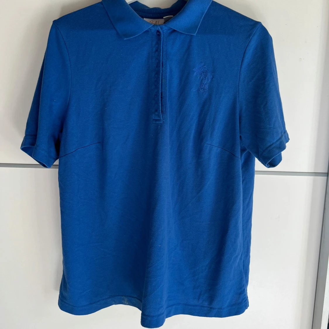 Blå pikétröja från Paola