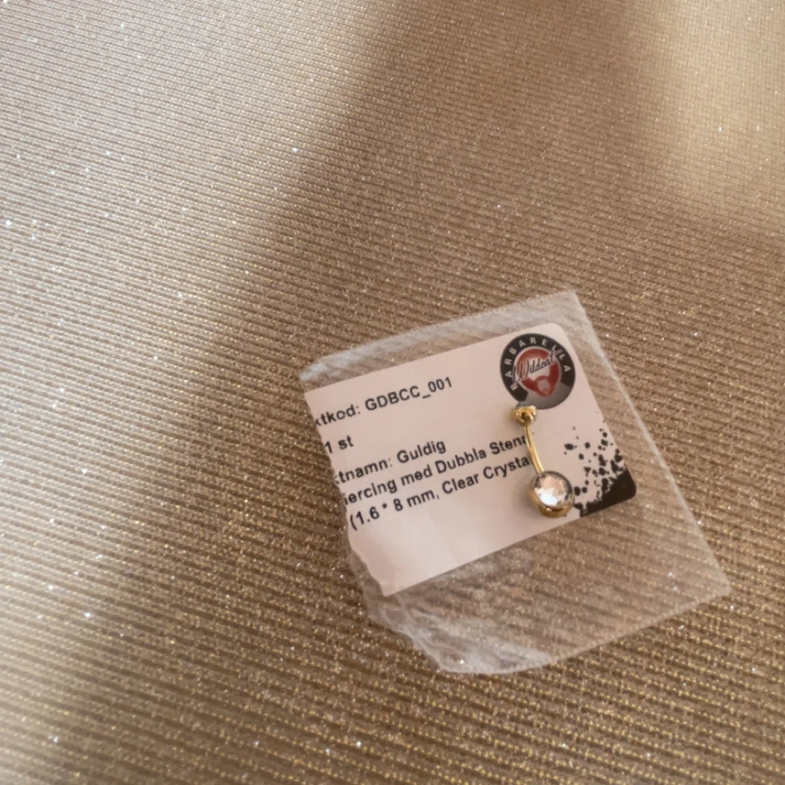 Guldig piercing med dubbla stenar - 1