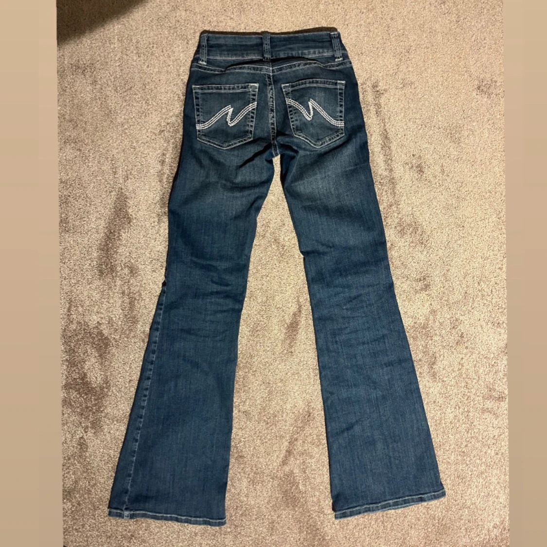 Low waisted stitch jeans - 1
