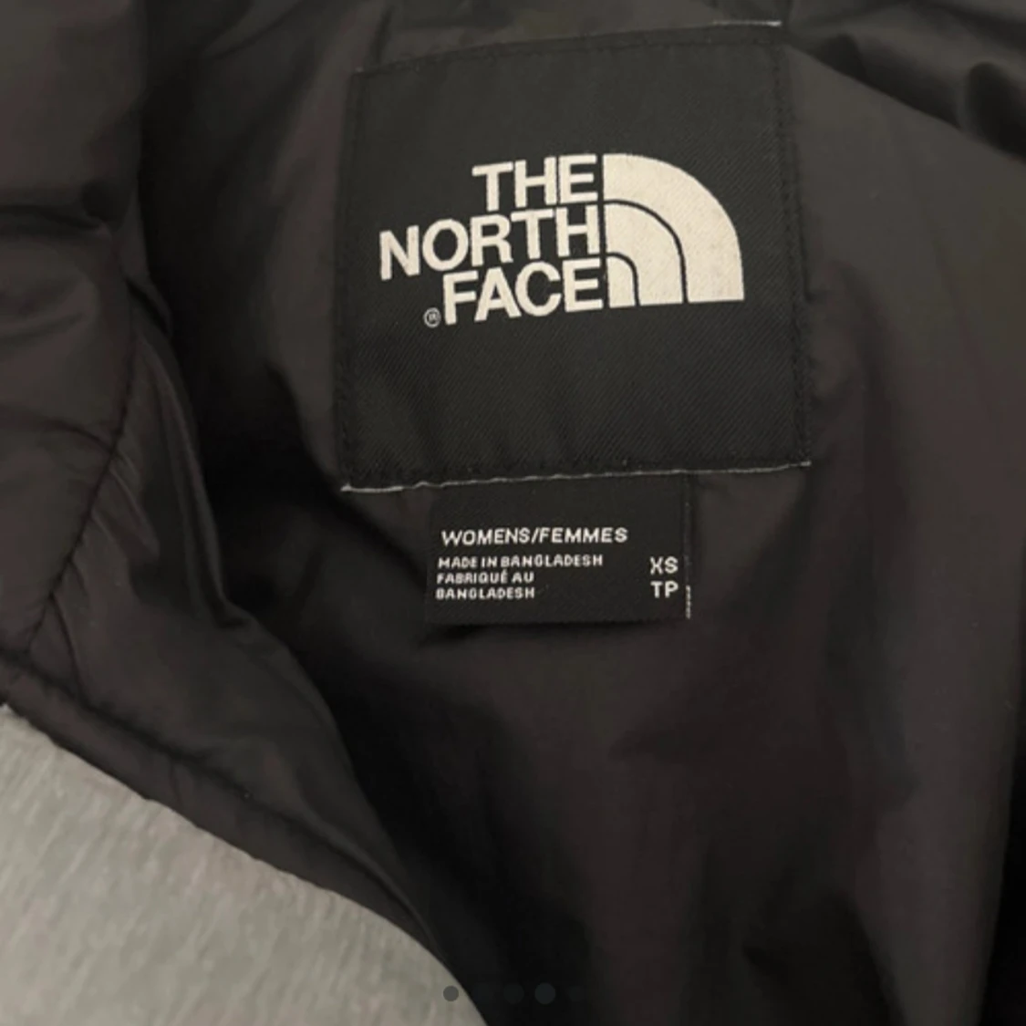 Grå pufferjacka från The North Face XS - 3