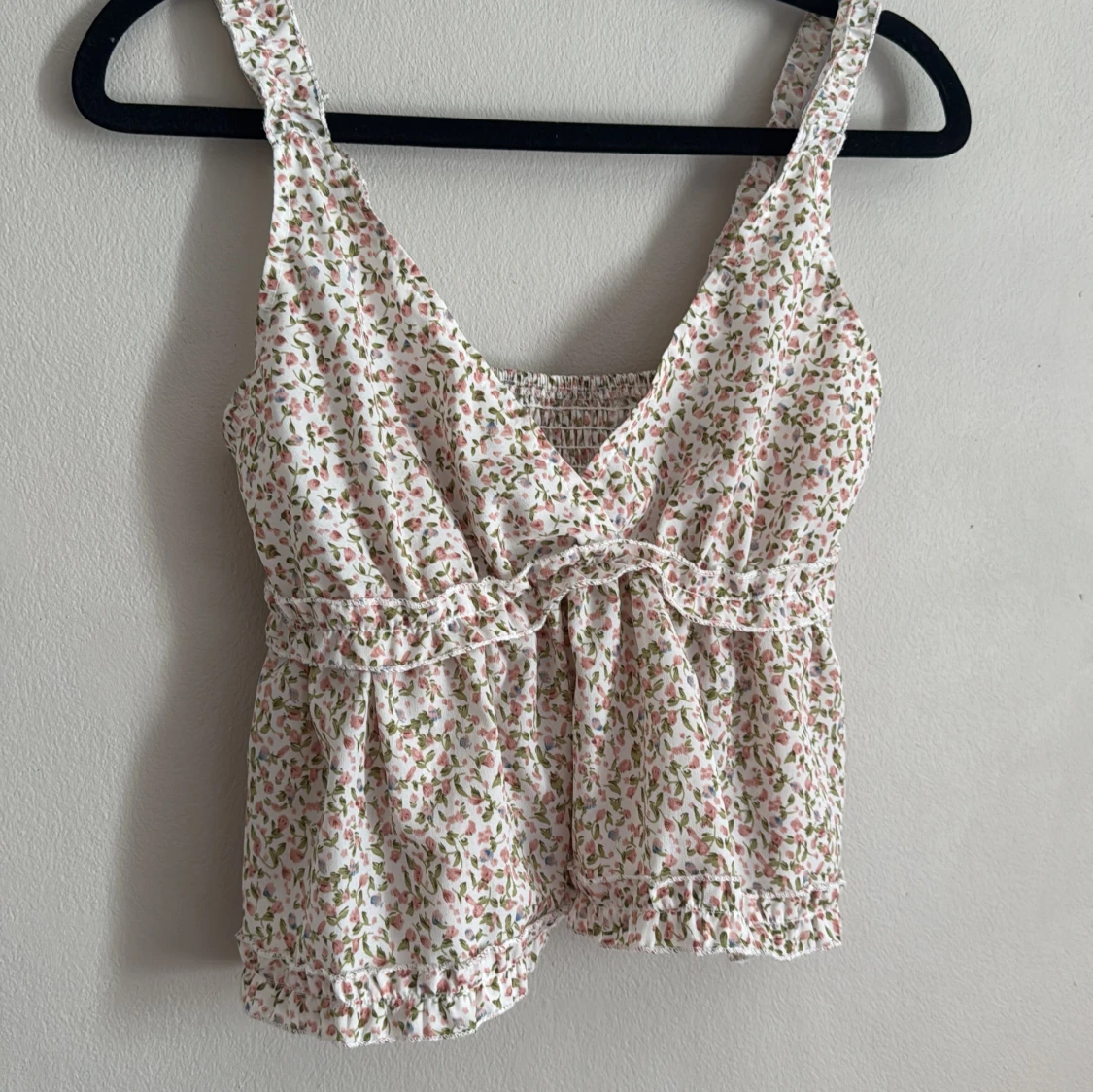 Blommig ärmlös topp