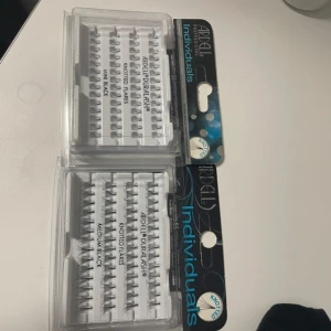 Ardell Individuals Knot-Free Lashes - Två förpackningar av Ardell Individuals Knot-Free Lashes. Dessa individuella lösögonfransar är perfekta för att skapa en naturlig look. De är knutfria och kommer i olika längder för anpassad volym och längd.