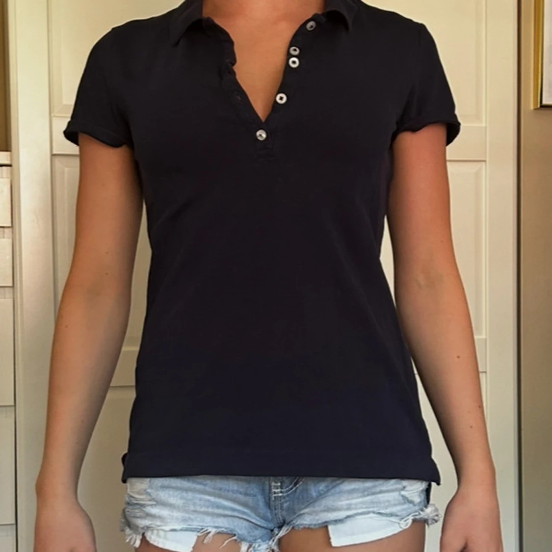 Mörkblå piké från H&M  - 1