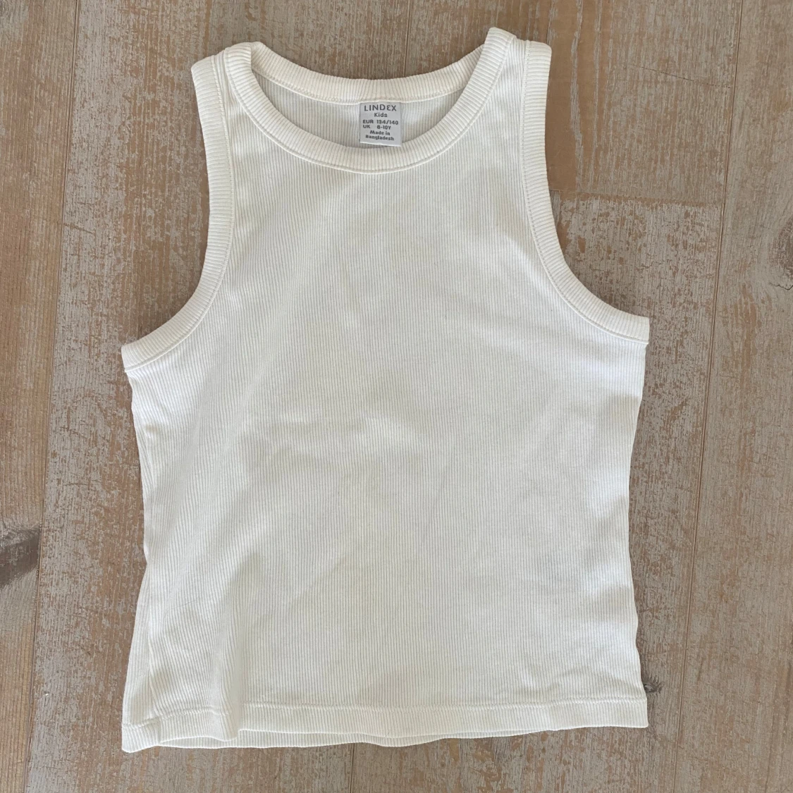 Vit ribbad linnetopp från Lindex