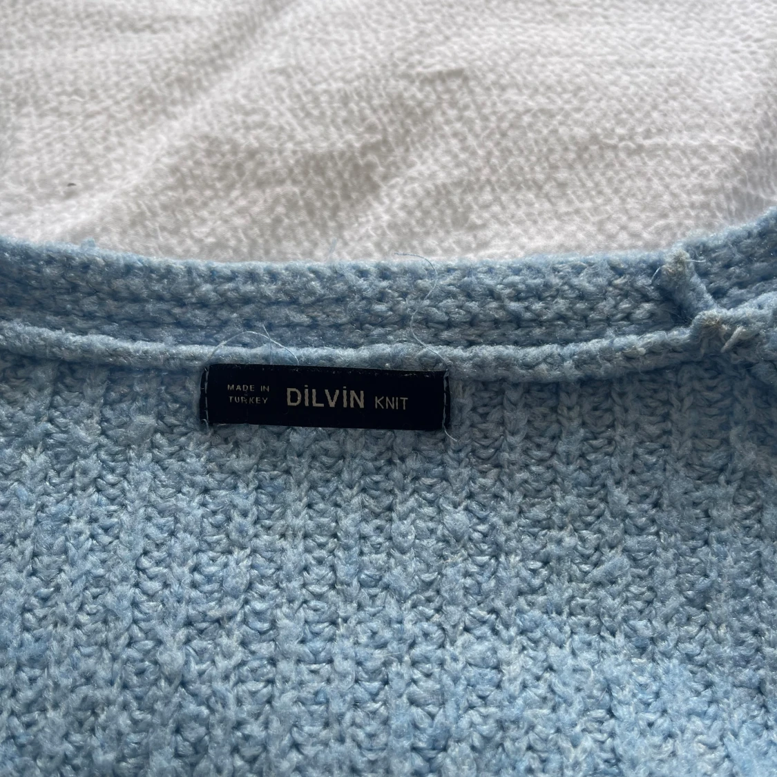 Ljusblå stickad tröja från Dilvin - 1
