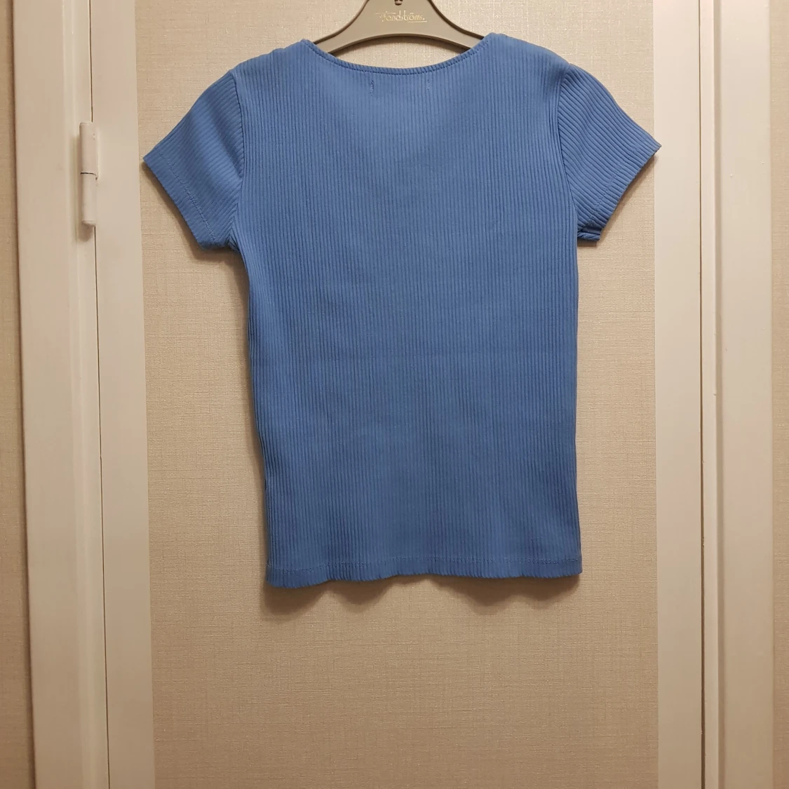 Blå ribbad topp med låsas knappar strl S - 3