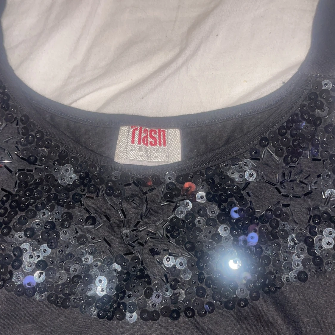 Svart paljettlinne från Flash - 1