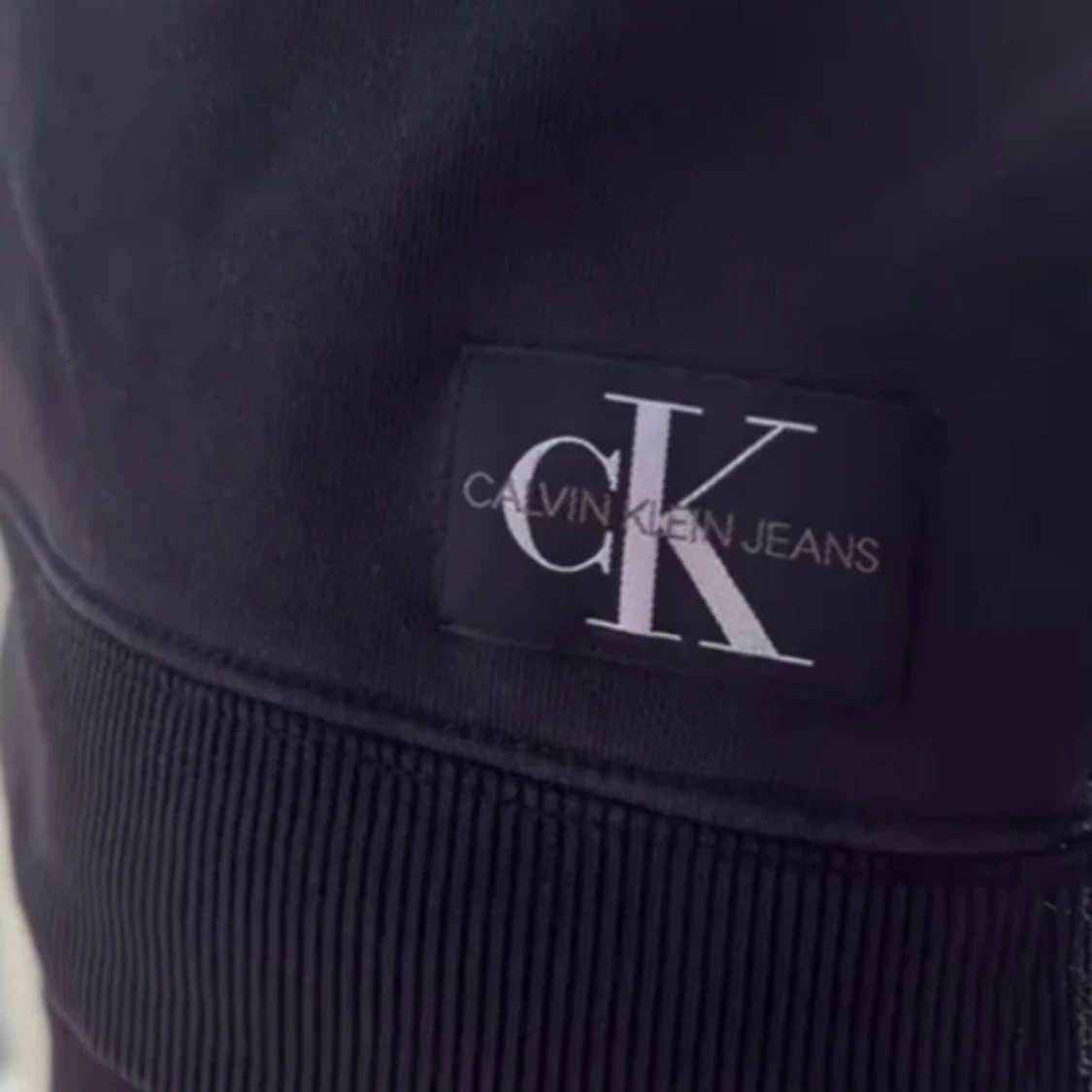 Svart hoodie från Calvin Klein Jeans - 1