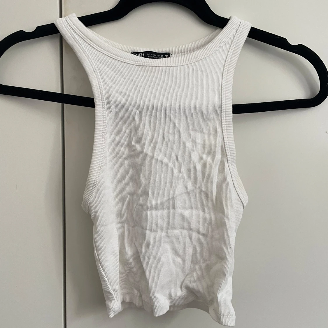 Vit ribbad linnetopp från Zara
