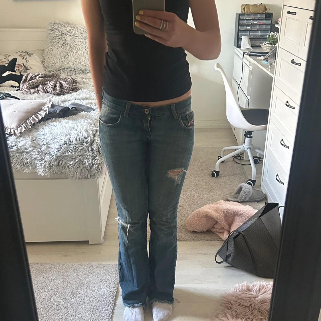 Diesel jeans med slitningar