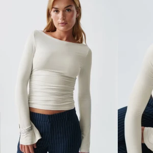 Soft touch topp från Gina - Säljer en vit/beige långärmad topp från Gina tricit. Använd ca 3 ggr. 