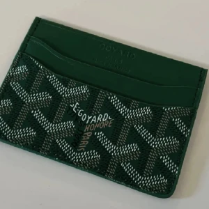 Korthållare - Korthållare i grön färg. Priset kan diskuteras.