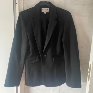 Blazer  - Super snygg kavaj från Nakd i storlek 34, som ny då den knappt är använd.