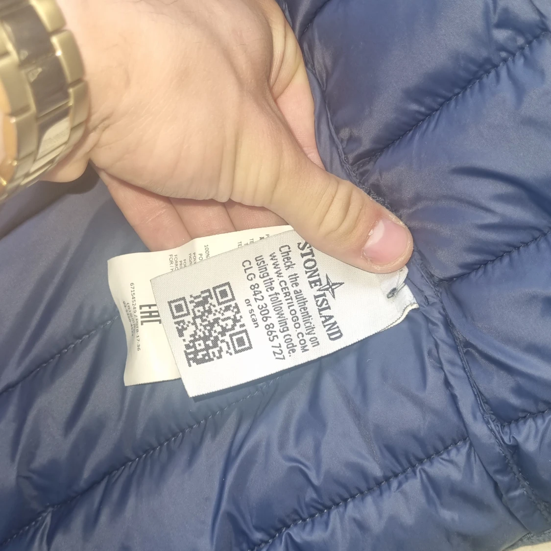 Blå pufferjacka från Stone Island - 1