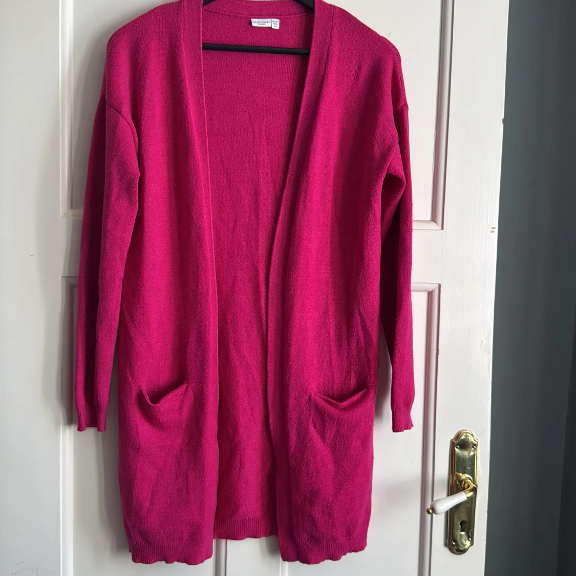 Ceriserosa stickad kofta från Name It