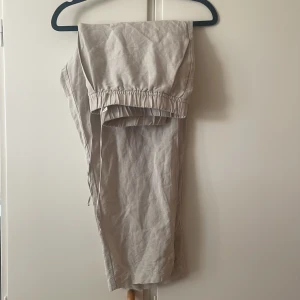 Linnebyxor  - Beigea linnebyxor 