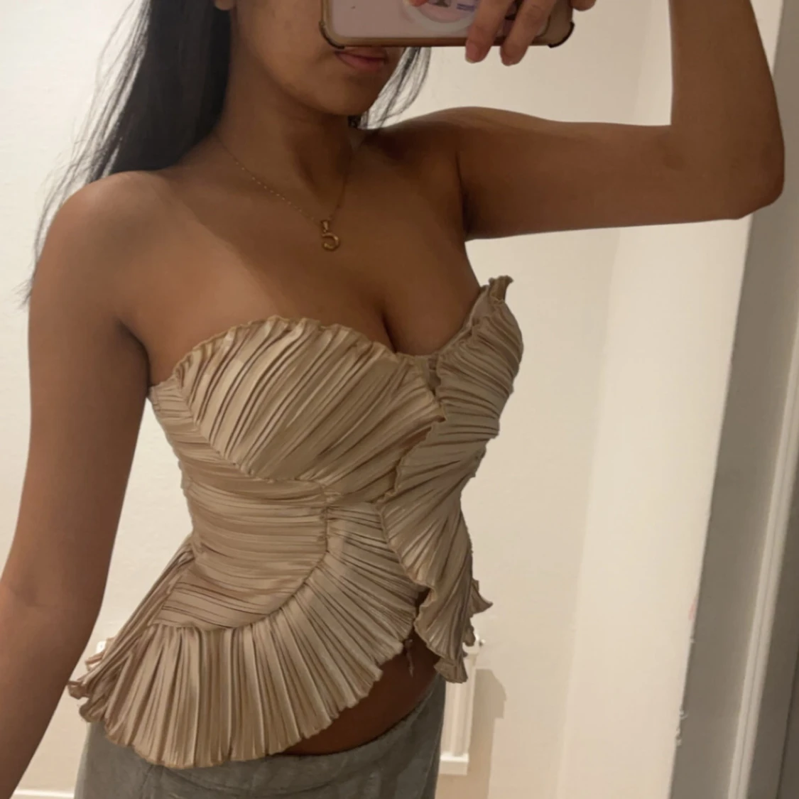 Beige plisserad korsett