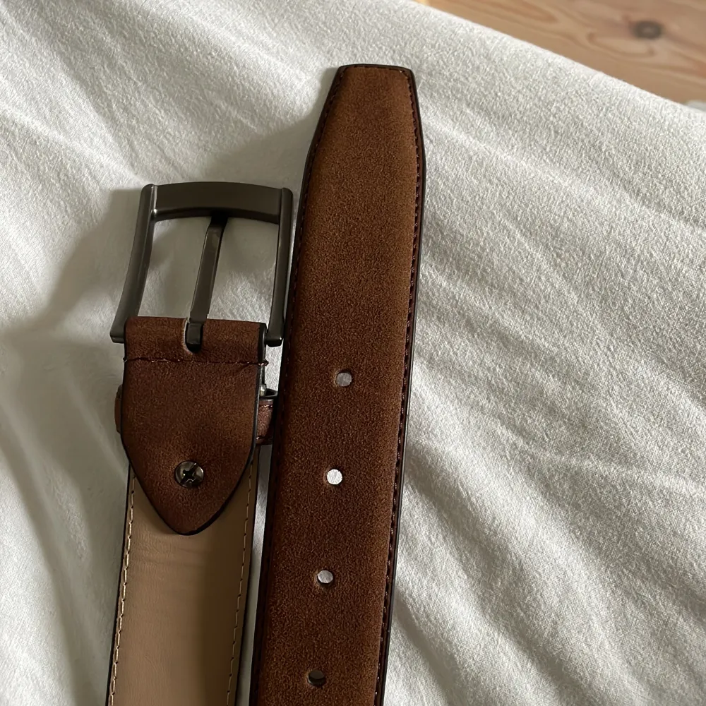 Snyggt mockabälte som jag inte har någon användning för. Asusteet.