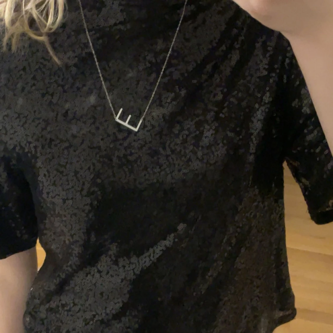 Svart glittrig topp - 90