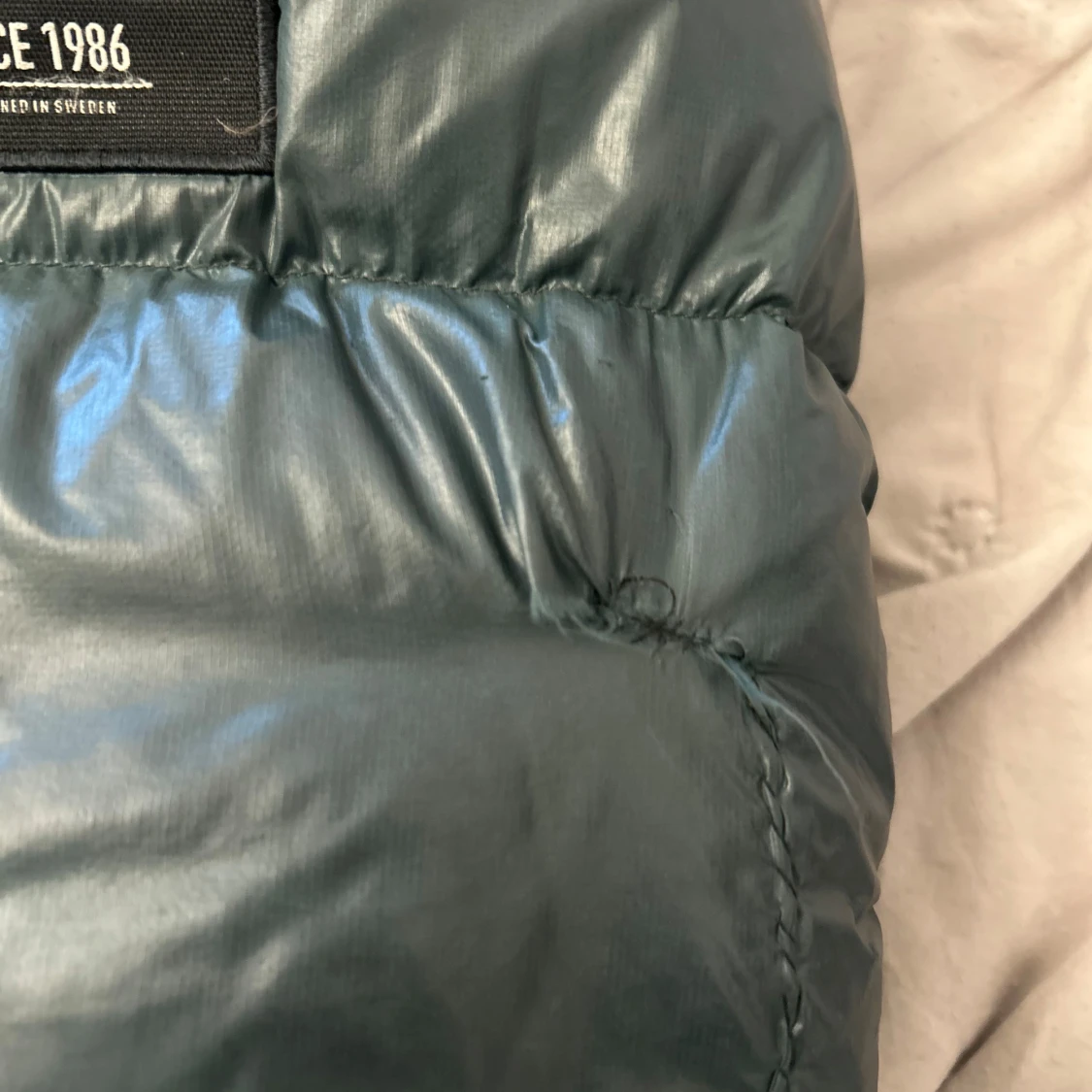 Grön pufferjacka från Peak Performance - 93