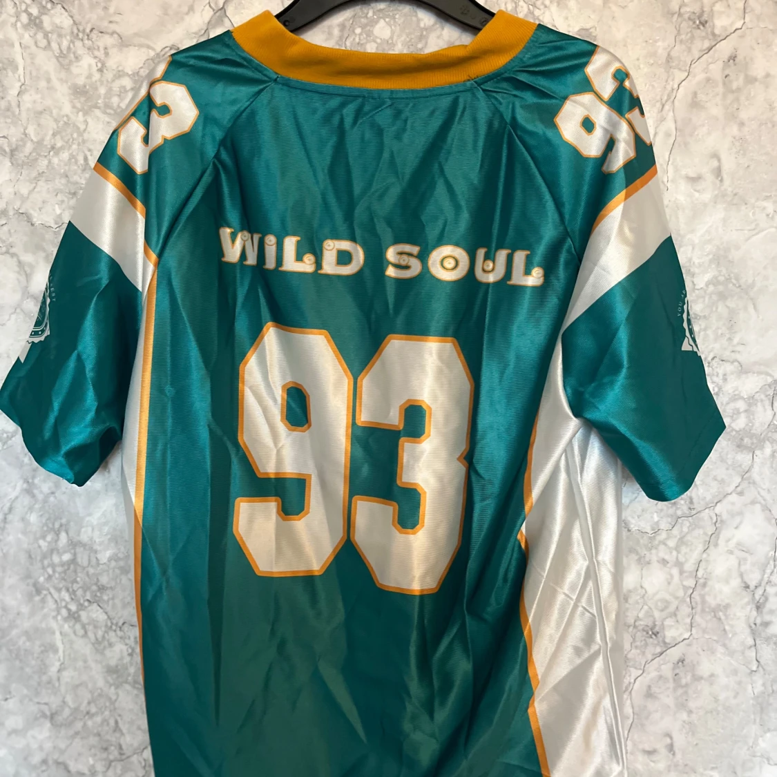 Turkos fotbollströja med nummer 93 - 90