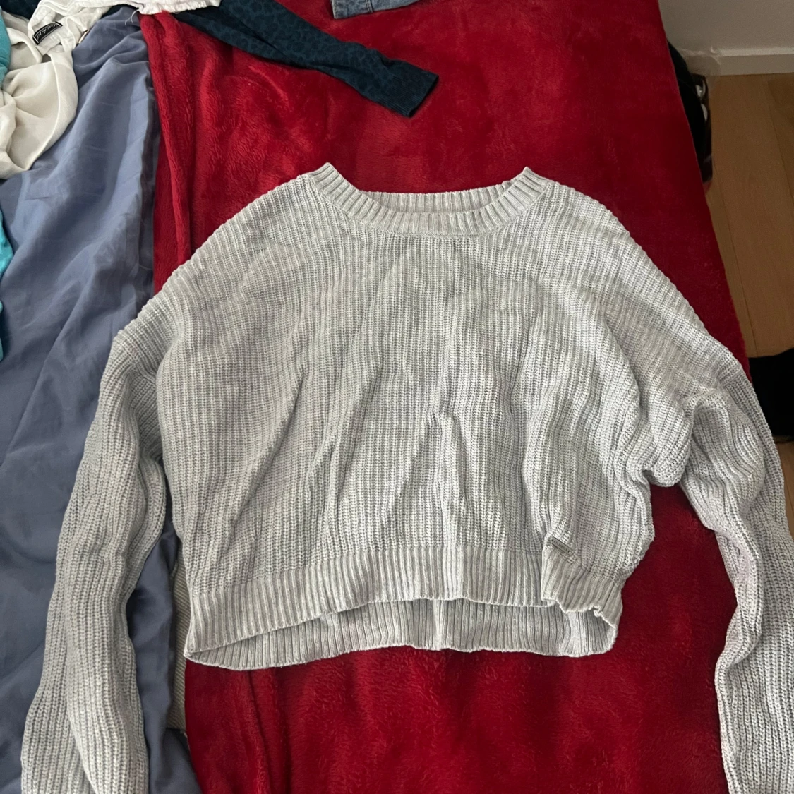 Grå stickad tröja från Hollister