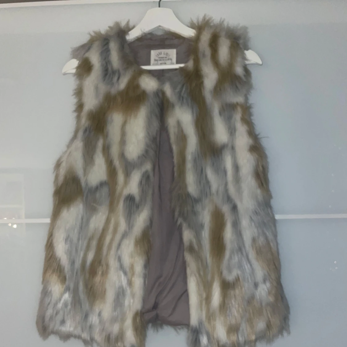 Mönstrad pälsväst