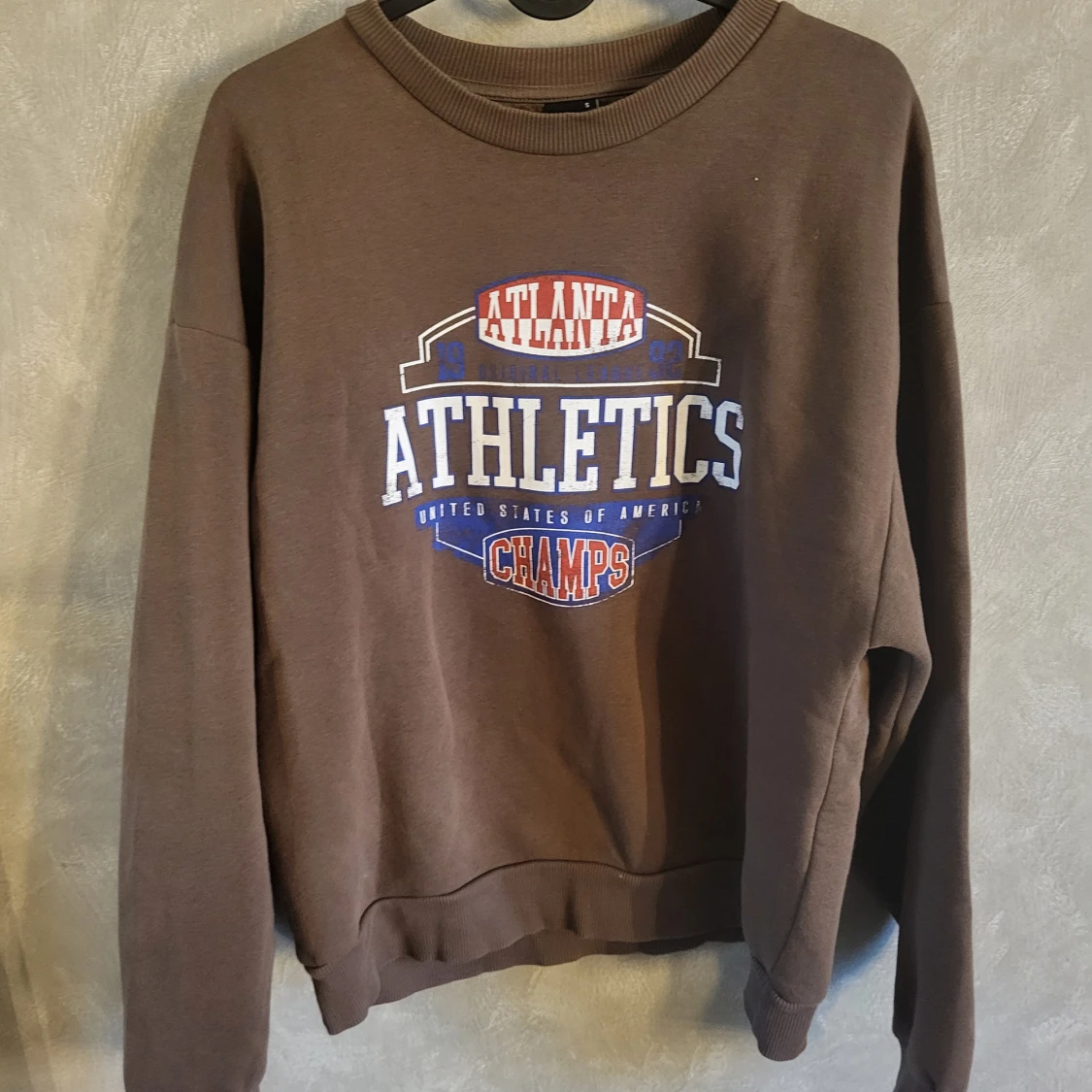 Brun sweatshirt från Gina Tricot