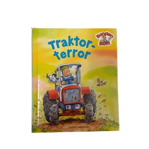 Traktor-terror - En färgglad barnbok med titeln 'Traktor-terror' av Steve Smallman. Omslaget visar en glad bonde som kör en röd traktor med en ko bredvid. Boken ingår i serien Bonden Blom och har en lekfull och äventyrlig känsla.