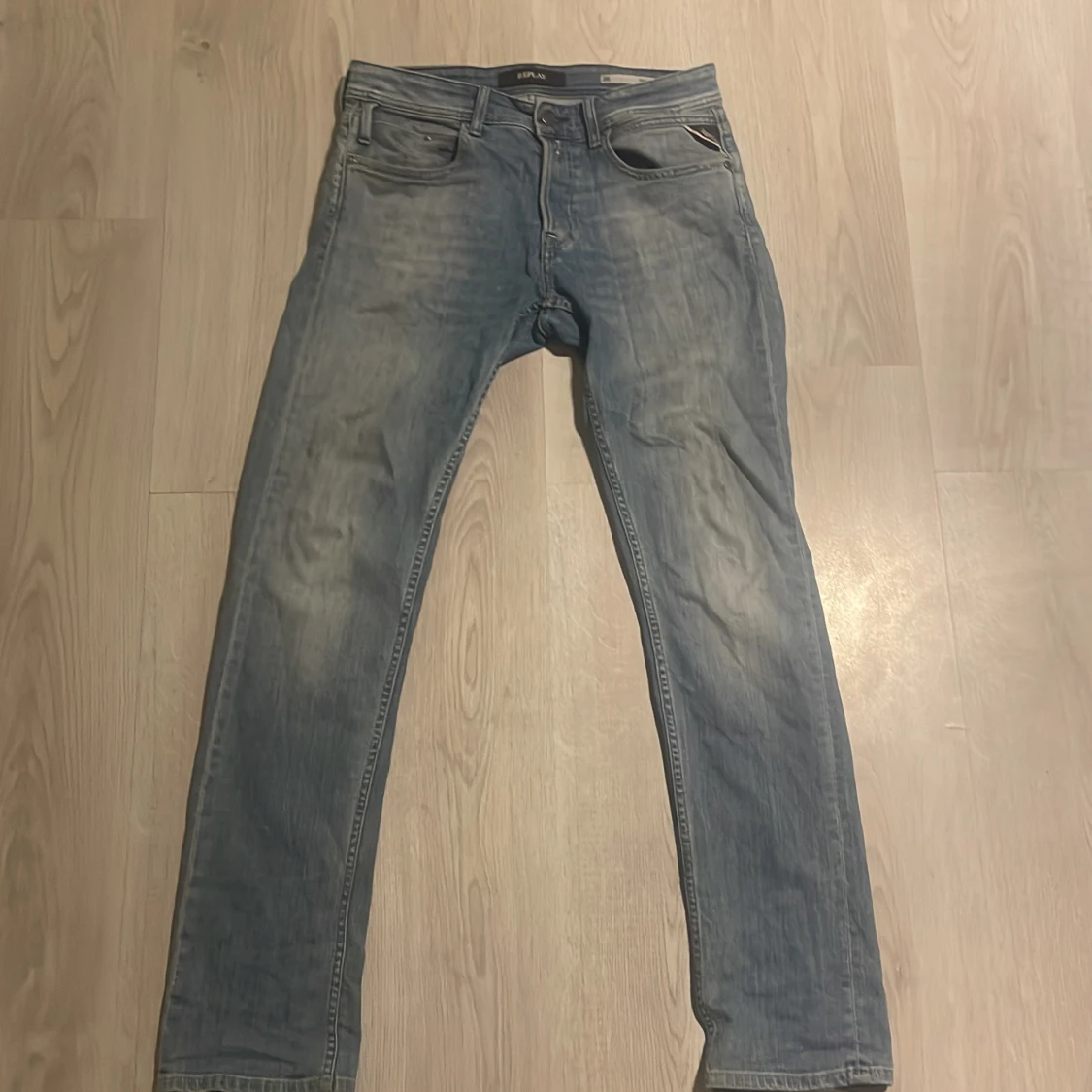 Ljusblåa Replay jeans 