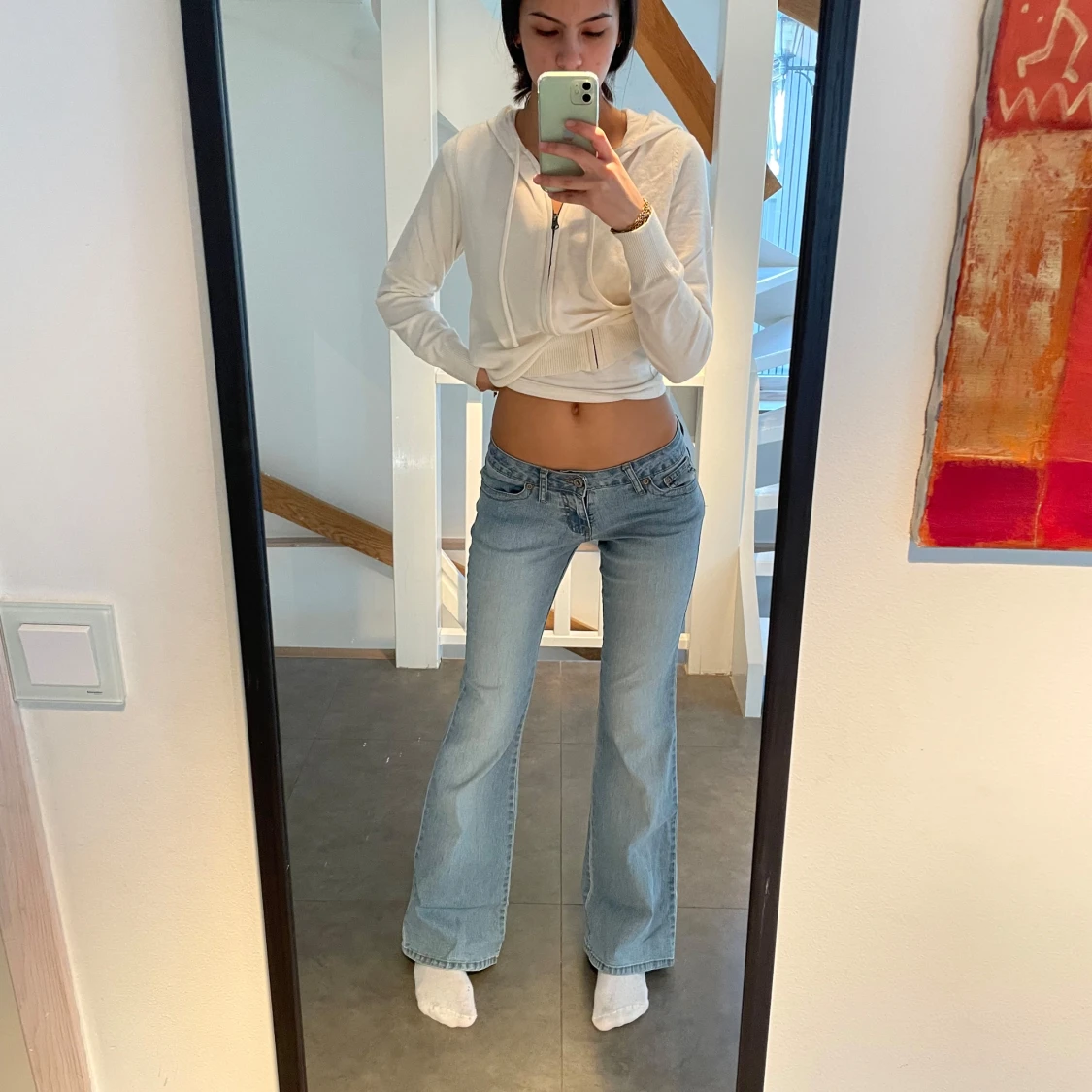Lågmidjade bootcut jeans med unika fickor - 3