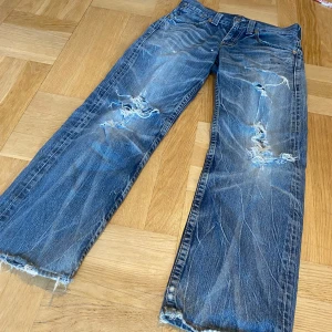 ovanliga Levis Jeans - Ett vintage par Levis jeans. Sjuk wash. Flera unika detaljer.