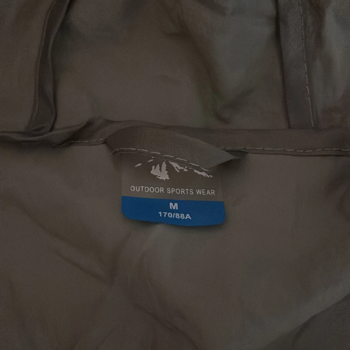 Grå vindjacka från Under Armour - 93