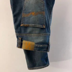 Nudie jeans - Hej! Säljer ett par fina Nudie jeans i storlek W33 L30. Modellen är grim Tim. Hör av vid frågor😊