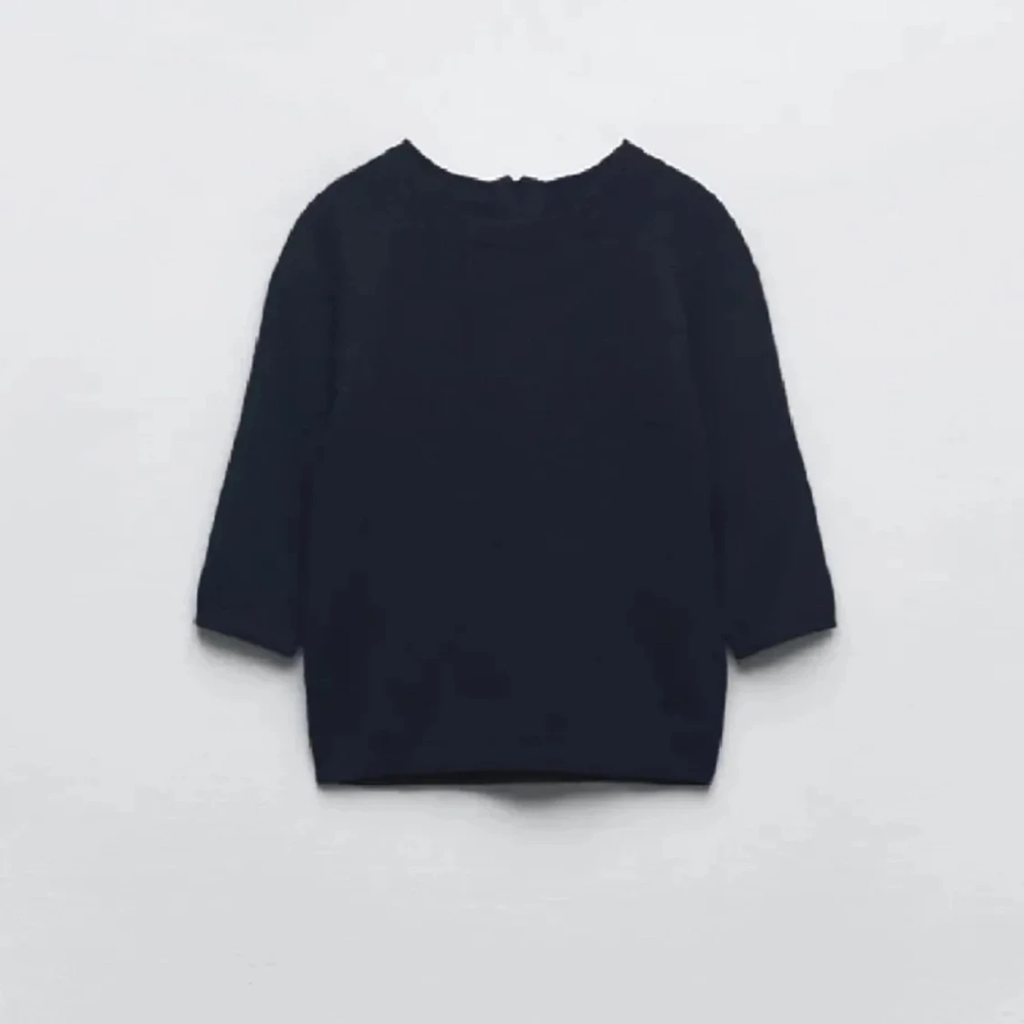 Svart tröja med trekvartsärm