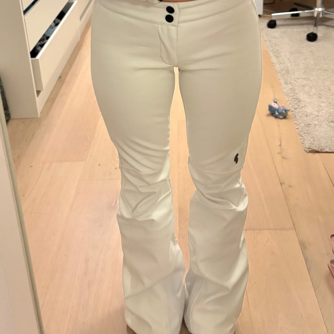 Vita byxor med bootcut - 90