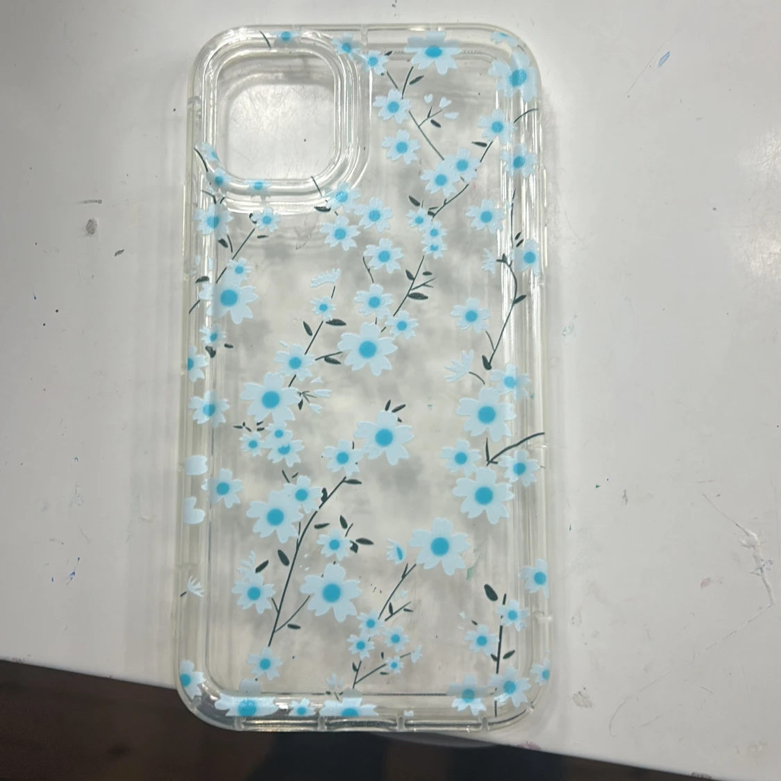 Transparent mobilskal med blommönster