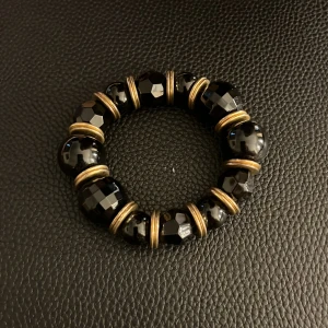 Chunky armband - Ett svart/guld Chunky armband 