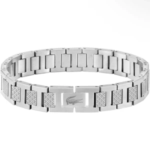 Lacost armband Silver - Snyggt och stilrent armband i silverfärg med mönster och en lacost-logga. Armbandet är helt nytt och onanvänt, det tillkommer box, påse osv. Säljs pga att jag råka beställa 2 st. Nypris: 1200kr För bilder och mått hör av dig!