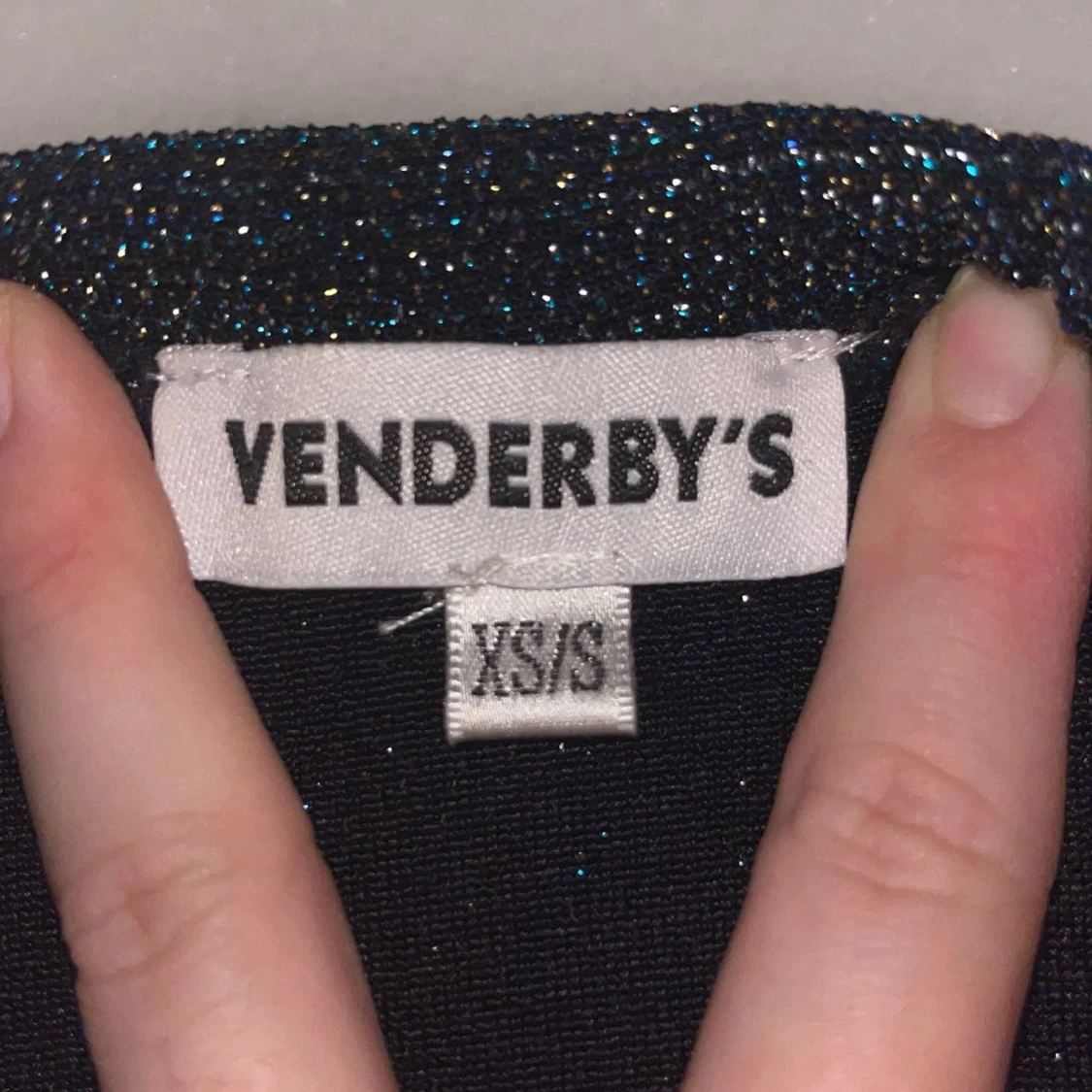 Glittrig kjol från Venderby's - 90