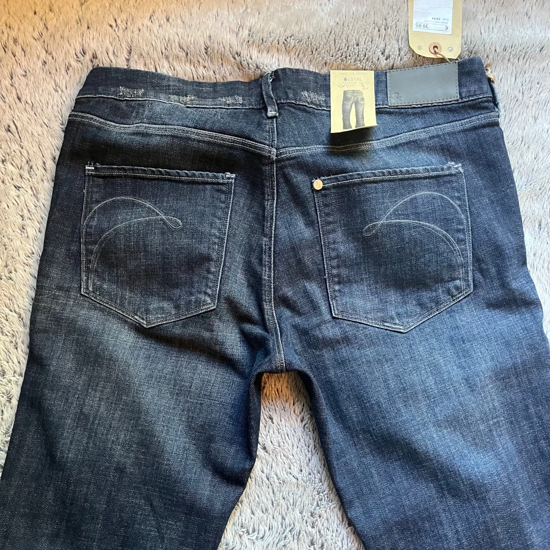 LOW RISE BOOTCUT JEANS - 92