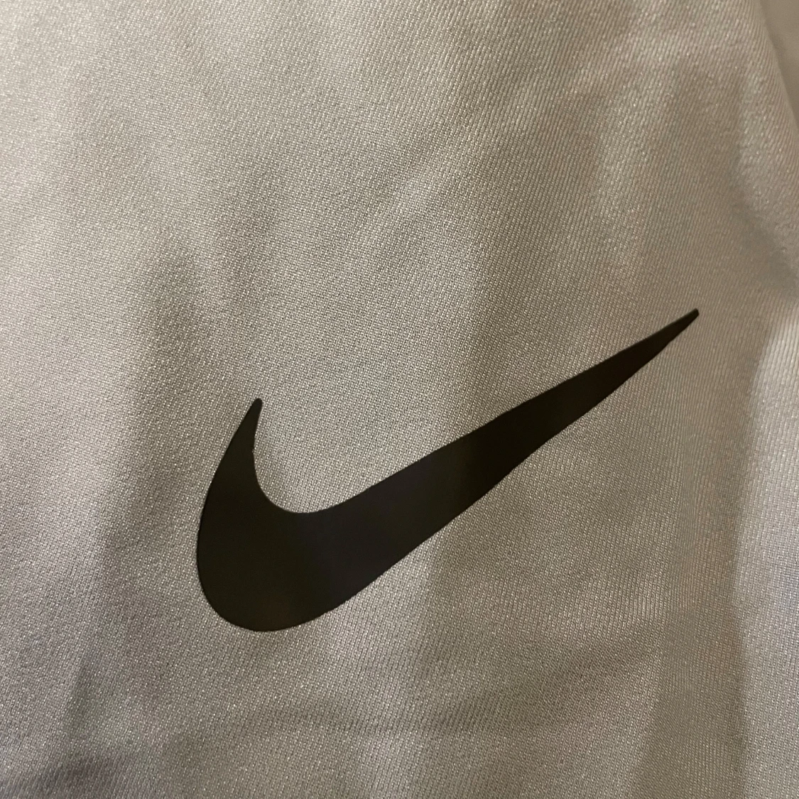 Gråa trackbyxor från Nike - 92