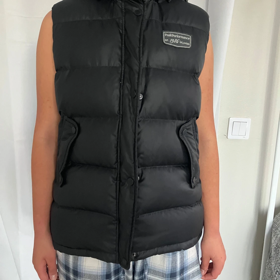 Svart dunväst från Peak Performance - 92