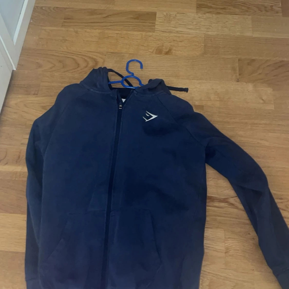Mörkblå zip hoodie från Gymshark - 90