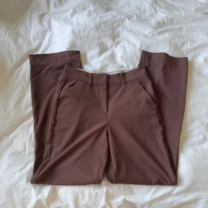 bruna kostymbyxor - sparsamt använda 